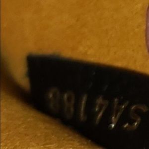 This is an Authentic LOUIS VUITTON Damier Ebene Clapton in Black.